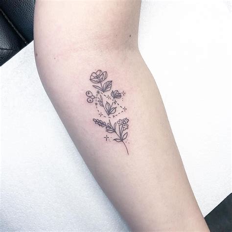 capricorn tattoos with flowers